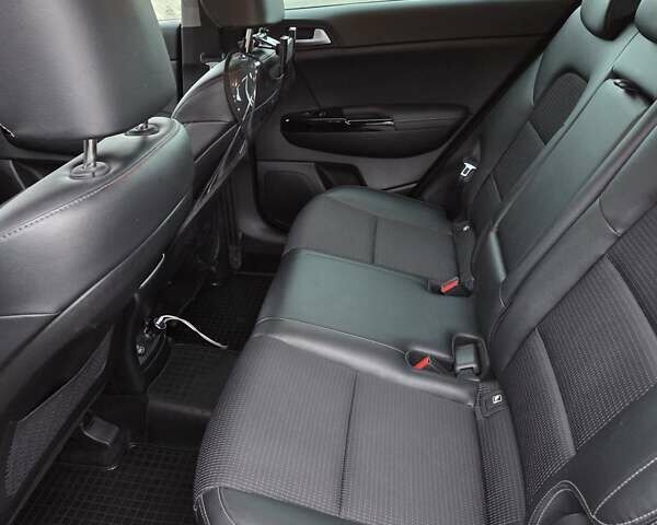 Черный Киа Sportage, объемом двигателя 2 л и пробегом 90 тыс. км за 26000 $, фото 29 на Automoto.ua