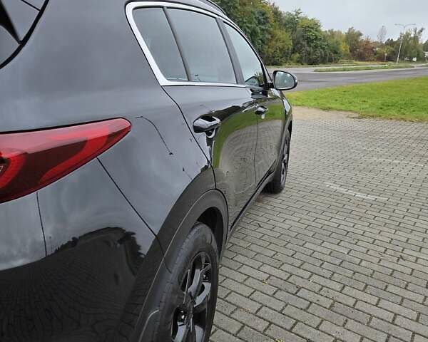 Черный Киа Sportage, объемом двигателя 2 л и пробегом 90 тыс. км за 26000 $, фото 5 на Automoto.ua