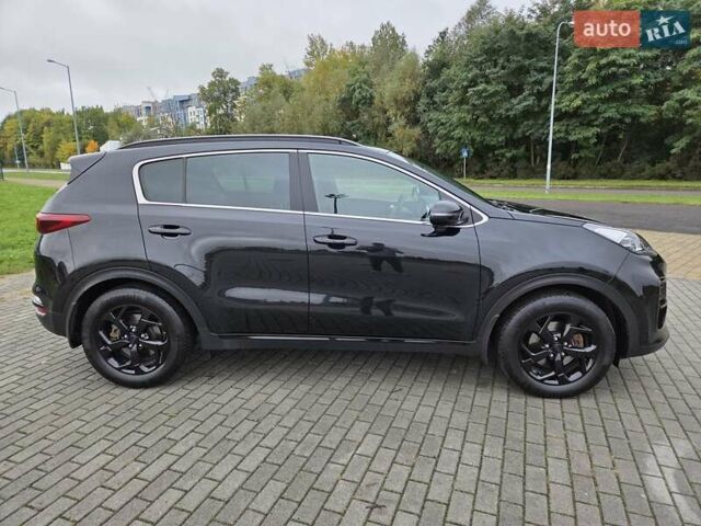 Черный Киа Sportage, объемом двигателя 2 л и пробегом 90 тыс. км за 26000 $, фото 4 на Automoto.ua