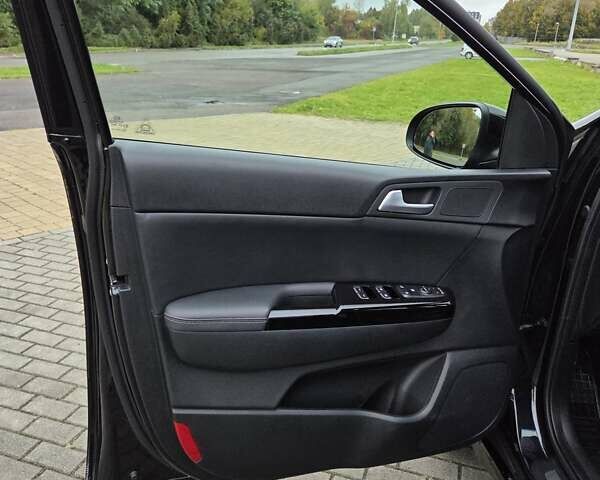 Черный Киа Sportage, объемом двигателя 2 л и пробегом 90 тыс. км за 26000 $, фото 27 на Automoto.ua
