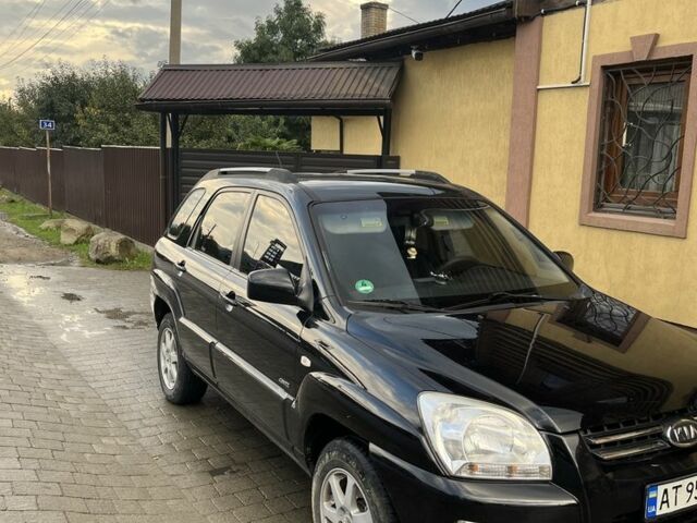 Черный Киа Sportage, объемом двигателя 2 л и пробегом 257 тыс. км за 7900 $, фото 7 на Automoto.ua