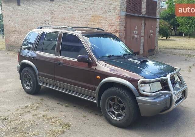 Фиолетовый Киа Sportage, объемом двигателя 2 л и пробегом 310 тыс. км за 4500 $, фото 8 на Automoto.ua