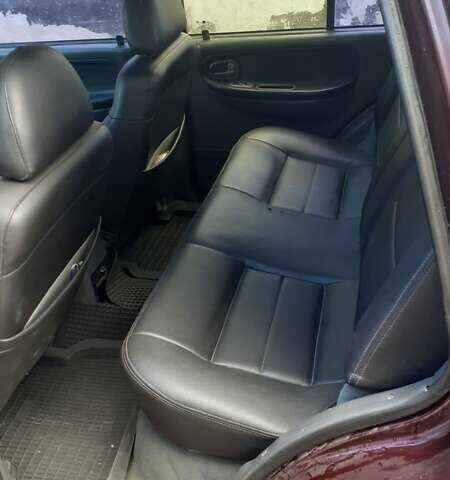 Фиолетовый Киа Sportage, объемом двигателя 2 л и пробегом 310 тыс. км за 4500 $, фото 2 на Automoto.ua