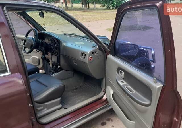 Фиолетовый Киа Sportage, объемом двигателя 2 л и пробегом 310 тыс. км за 4500 $, фото 3 на Automoto.ua