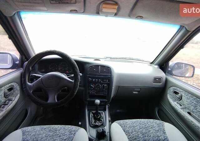 Фіолетовий Кіа Sportage, об'ємом двигуна 2 л та пробігом 155 тис. км за 3600 $, фото 8 на Automoto.ua