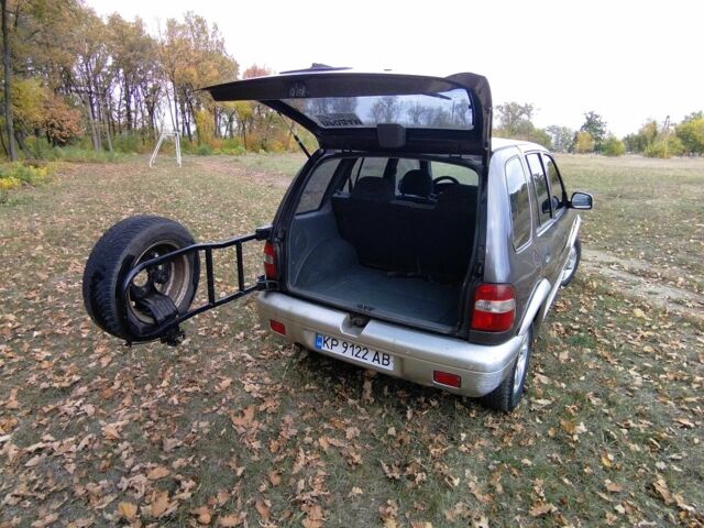 Фіолетовий Кіа Sportage, об'ємом двигуна 2 л та пробігом 200 тис. км за 3600 $, фото 10 на Automoto.ua