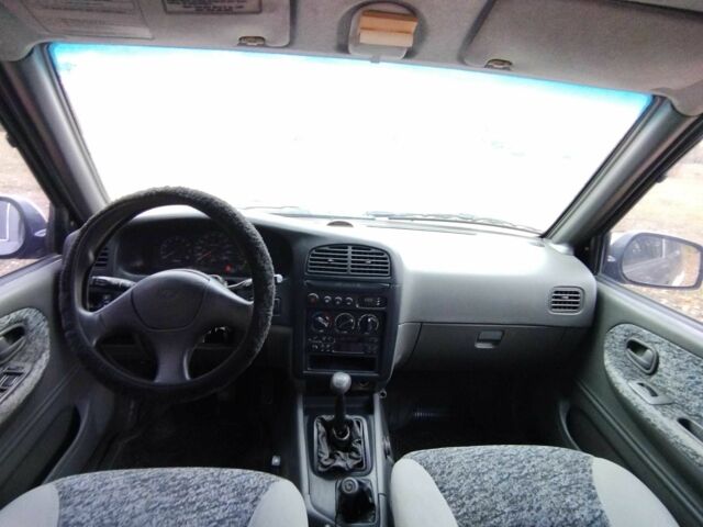 Фіолетовий Кіа Sportage, об'ємом двигуна 2 л та пробігом 200 тис. км за 3600 $, фото 8 на Automoto.ua