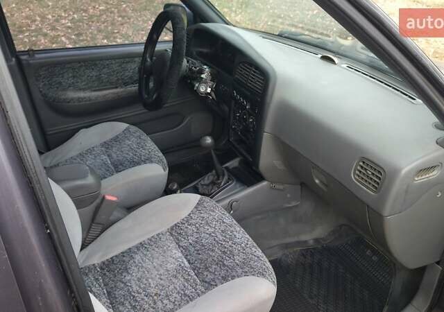 Фіолетовий Кіа Sportage, об'ємом двигуна 2 л та пробігом 155 тис. км за 3600 $, фото 6 на Automoto.ua