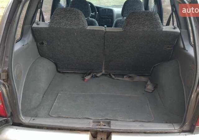 Фіолетовий Кіа Sportage, об'ємом двигуна 2 л та пробігом 155 тис. км за 3600 $, фото 11 на Automoto.ua