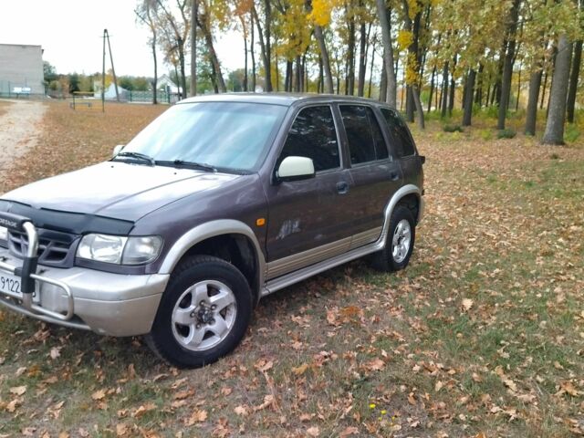 Фіолетовий Кіа Sportage, об'ємом двигуна 2 л та пробігом 200 тис. км за 3600 $, фото 2 на Automoto.ua