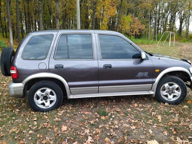 Фіолетовий Кіа Sportage, об'ємом двигуна 2 л та пробігом 200 тис. км за 3600 $, фото 4 на Automoto.ua