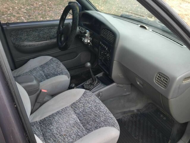 Фіолетовий Кіа Sportage, об'ємом двигуна 2 л та пробігом 200 тис. км за 3600 $, фото 6 на Automoto.ua