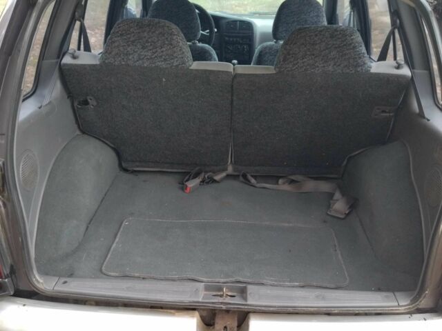 Фіолетовий Кіа Sportage, об'ємом двигуна 2 л та пробігом 200 тис. км за 3600 $, фото 11 на Automoto.ua