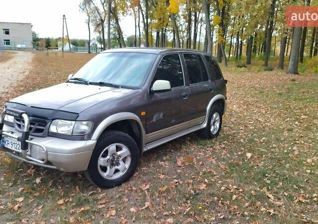 Фіолетовий Кіа Sportage, об'ємом двигуна 2 л та пробігом 155 тис. км за 3600 $, фото 2 на Automoto.ua