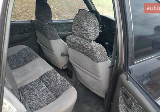 Фіолетовий Кіа Sportage, об'ємом двигуна 2 л та пробігом 155 тис. км за 3600 $, фото 9 на Automoto.ua