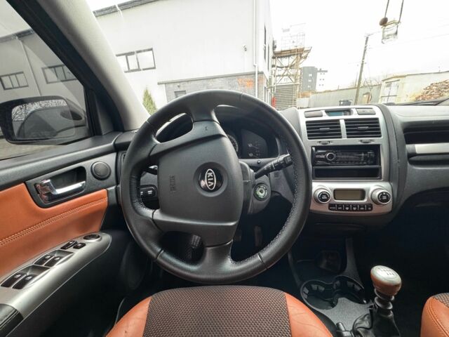 Коричневый Киа Sportage, объемом двигателя 2 л и пробегом 268 тыс. км за 6999 $, фото 18 на Automoto.ua