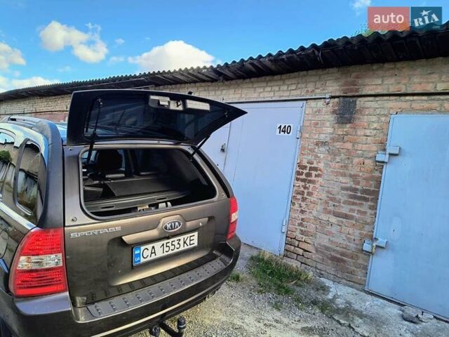Коричневий Кіа Sportage, об'ємом двигуна 1.99 л та пробігом 242 тис. км за 8700 $, фото 4 на Automoto.ua