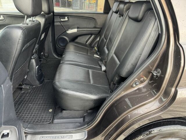Коричневий Кіа Sportage, об'ємом двигуна 2 л та пробігом 247 тис. км за 3600 $, фото 11 на Automoto.ua