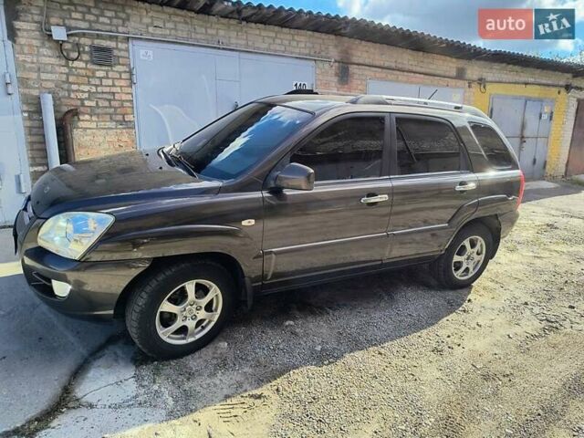 Коричневий Кіа Sportage, об'ємом двигуна 1.99 л та пробігом 242 тис. км за 8700 $, фото 1 на Automoto.ua