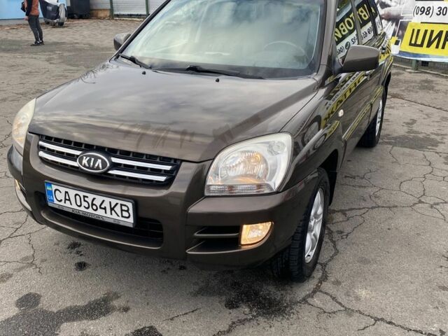 Коричневый Киа Sportage, объемом двигателя 2 л и пробегом 241 тыс. км за 8000 $, фото 1 на Automoto.ua