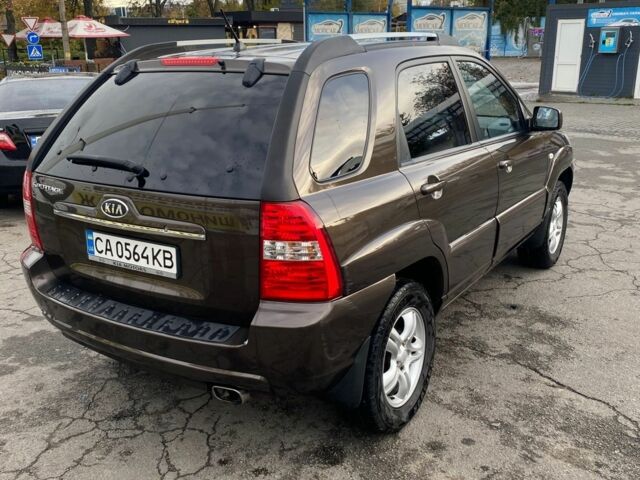 Коричневый Киа Sportage, объемом двигателя 2 л и пробегом 241 тыс. км за 8000 $, фото 2 на Automoto.ua