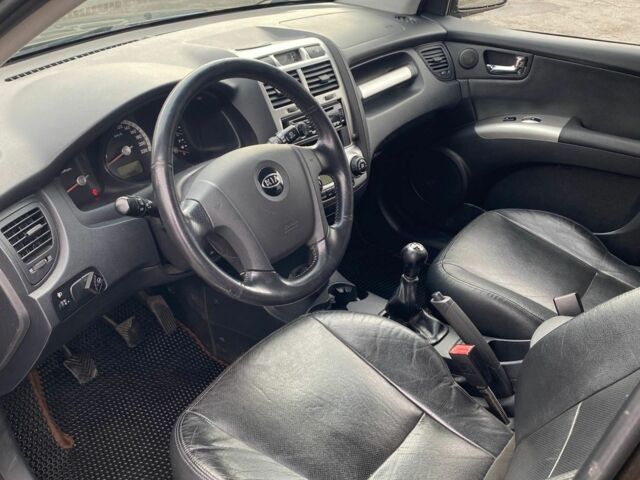 Коричневый Киа Sportage, объемом двигателя 2 л и пробегом 241 тыс. км за 8000 $, фото 6 на Automoto.ua