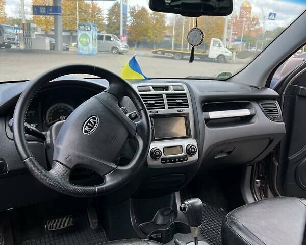 Коричневый Киа Sportage, объемом двигателя 2 л и пробегом 178 тыс. км за 8200 $, фото 13 на Automoto.ua