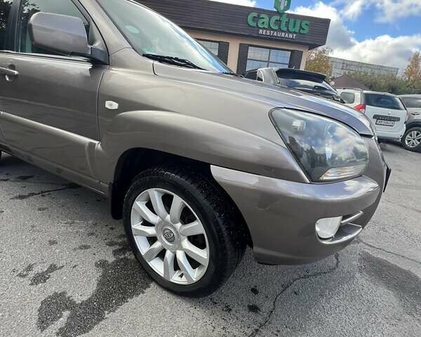 Коричневый Киа Sportage, объемом двигателя 2 л и пробегом 178 тыс. км за 8200 $, фото 4 на Automoto.ua