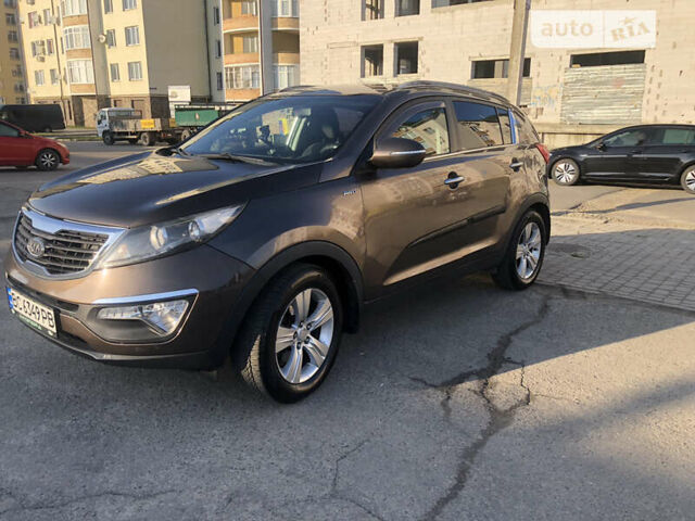 Коричневый Киа Sportage, объемом двигателя 2 л и пробегом 290 тыс. км за 11300 $, фото 2 на Automoto.ua