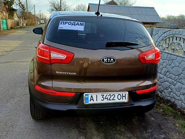 Коричневий Кіа Sportage, об'ємом двигуна 2.4 л та пробігом 210 тис. км за 10500 $, фото 2 на Automoto.ua