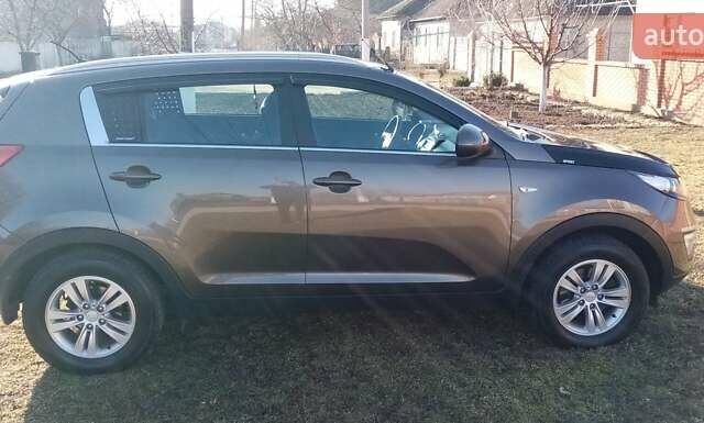 Коричневий Кіа Sportage, об'ємом двигуна 2 л та пробігом 103 тис. км за 12500 $, фото 3 на Automoto.ua