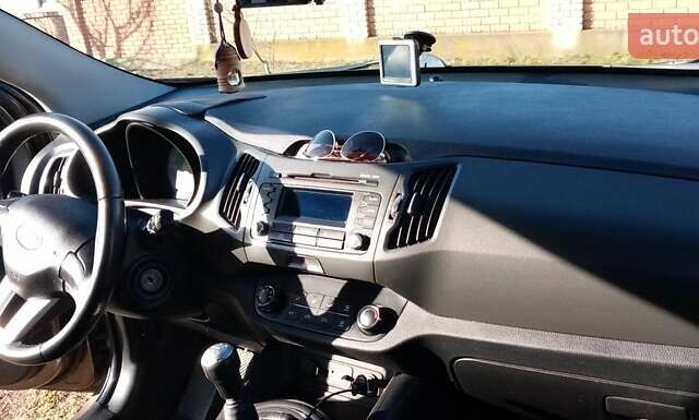 Коричневий Кіа Sportage, об'ємом двигуна 2 л та пробігом 103 тис. км за 12500 $, фото 1 на Automoto.ua