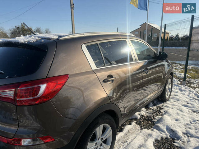 Коричневий Кіа Sportage, об'ємом двигуна 1.6 л та пробігом 236 тис. км за 11600 $, фото 4 на Automoto.ua