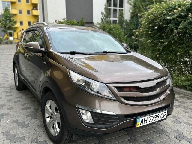 Коричневый Киа Sportage, объемом двигателя 2 л и пробегом 155 тыс. км за 13500 $, фото 1 на Automoto.ua