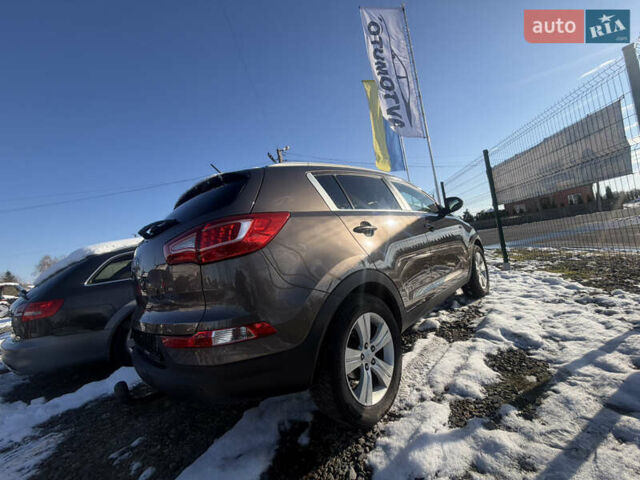 Коричневий Кіа Sportage, об'ємом двигуна 1.6 л та пробігом 236 тис. км за 11600 $, фото 26 на Automoto.ua