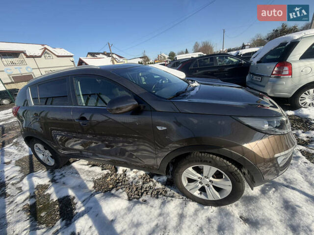 Коричневий Кіа Sportage, об'ємом двигуна 1.6 л та пробігом 236 тис. км за 11600 $, фото 6 на Automoto.ua