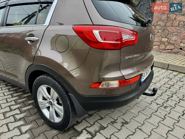 Коричневый Киа Sportage, объемом двигателя 2 л и пробегом 202 тыс. км за 12900 $, фото 14 на Automoto.ua