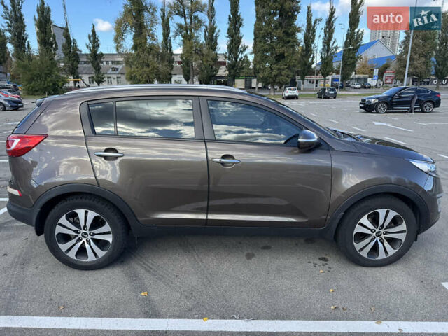 Коричневий Кіа Sportage, об'ємом двигуна 2 л та пробігом 188 тис. км за 14500 $, фото 7 на Automoto.ua