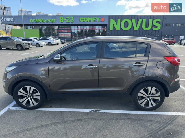 Коричневий Кіа Sportage, об'ємом двигуна 2 л та пробігом 188 тис. км за 14500 $, фото 3 на Automoto.ua