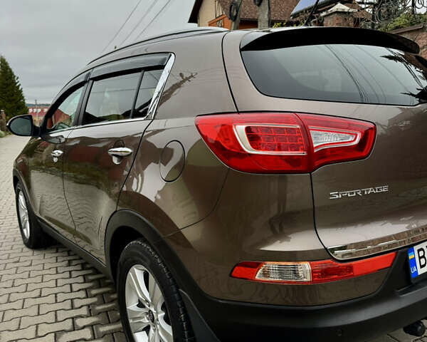 Коричневый Киа Sportage, объемом двигателя 2 л и пробегом 202 тыс. км за 12900 $, фото 11 на Automoto.ua