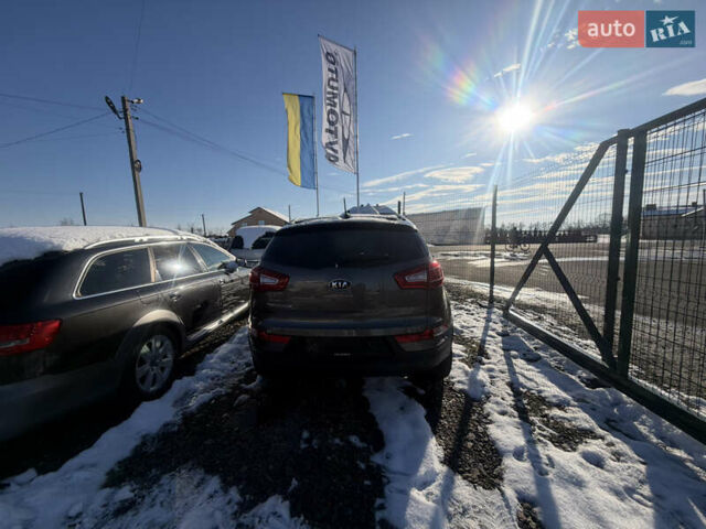 Коричневий Кіа Sportage, об'ємом двигуна 1.6 л та пробігом 236 тис. км за 11600 $, фото 2 на Automoto.ua