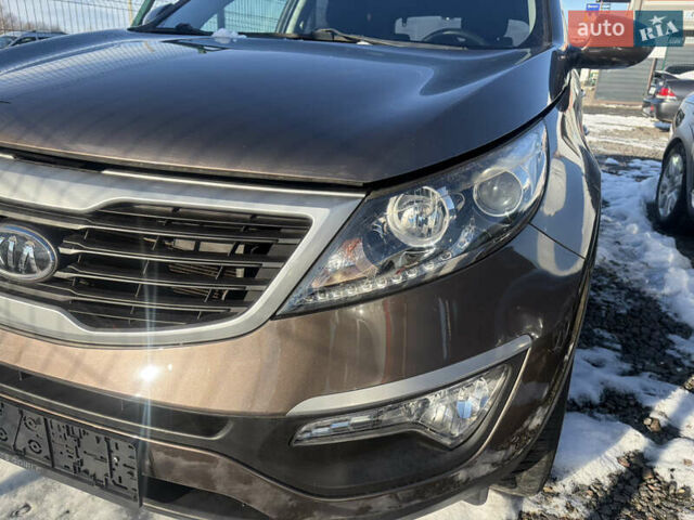 Коричневий Кіа Sportage, об'ємом двигуна 1.6 л та пробігом 236 тис. км за 11600 $, фото 19 на Automoto.ua