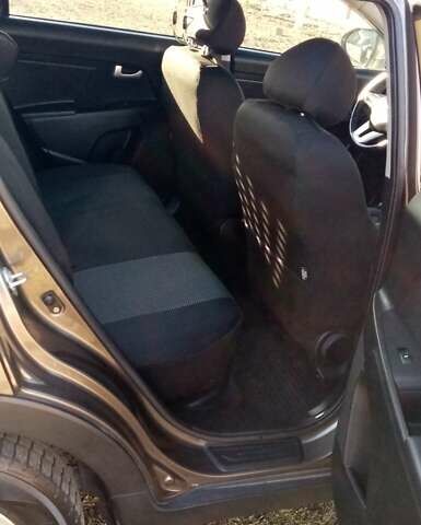 Коричневий Кіа Sportage, об'ємом двигуна 2 л та пробігом 103 тис. км за 12500 $, фото 11 на Automoto.ua