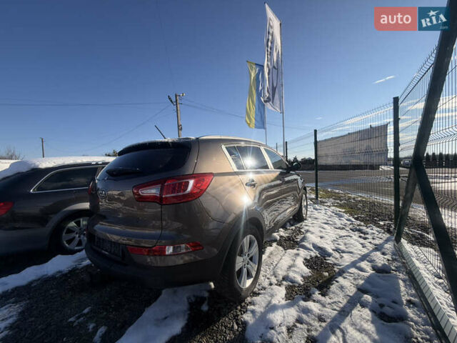 Коричневий Кіа Sportage, об'ємом двигуна 1.6 л та пробігом 236 тис. км за 11600 $, фото 5 на Automoto.ua