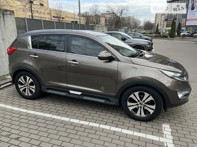 Коричневий Кіа Sportage, об'ємом двигуна 2 л та пробігом 194 тис. км за 15000 $, фото 5 на Automoto.ua