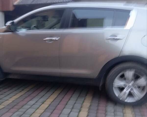 Коричневый Киа Sportage, объемом двигателя 2 л и пробегом 255 тыс. км за 12300 $, фото 1 на Automoto.ua