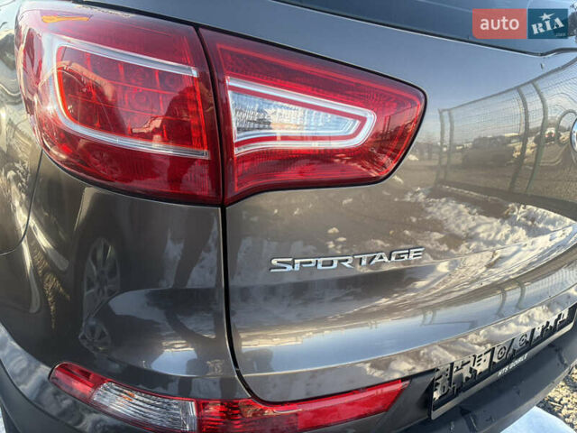 Коричневий Кіа Sportage, об'ємом двигуна 1.6 л та пробігом 236 тис. км за 11600 $, фото 11 на Automoto.ua