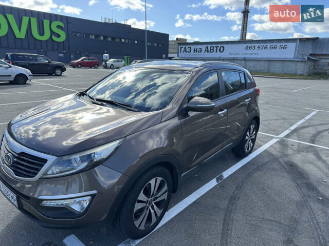 Коричневий Кіа Sportage, об'ємом двигуна 2 л та пробігом 188 тис. км за 14500 $, фото 2 на Automoto.ua