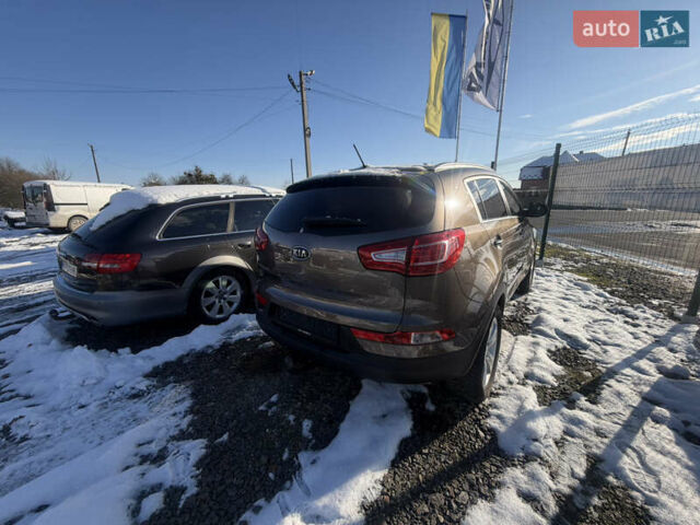 Коричневий Кіа Sportage, об'ємом двигуна 1.6 л та пробігом 236 тис. км за 11600 $, фото 1 на Automoto.ua