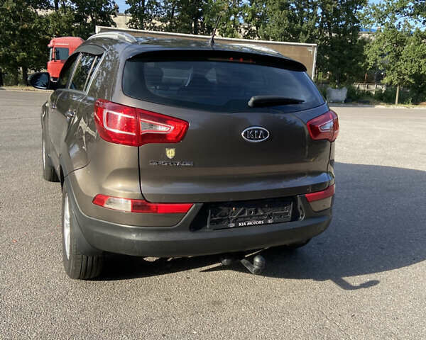 Коричневий Кіа Sportage, об'ємом двигуна 2 л та пробігом 173 тис. км за 11666 $, фото 4 на Automoto.ua